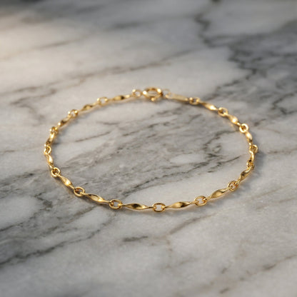 14k gold wave pattern bracelet