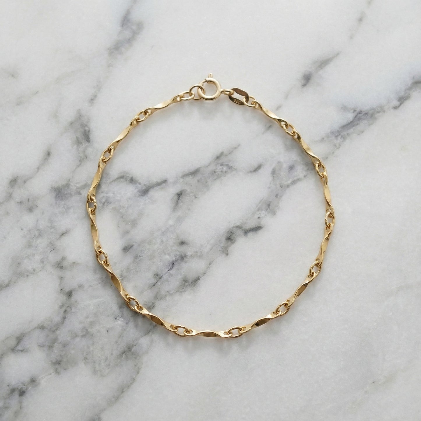 14k gold wave pattern bracelet